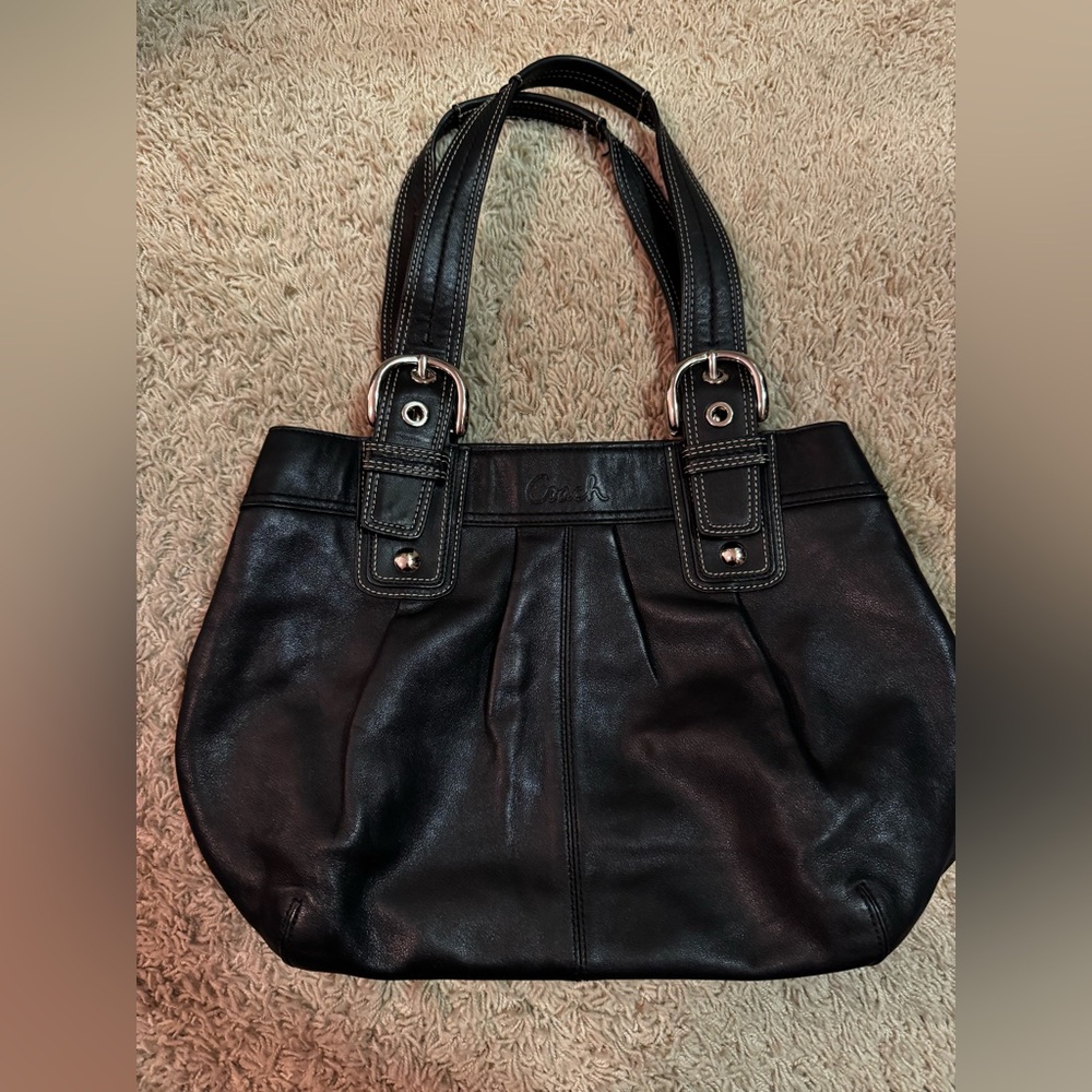 Coach shoulder bag—black with light blue interior.